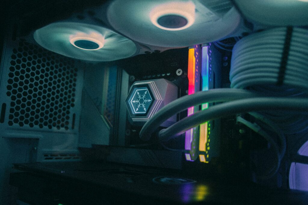 A close up of a computer tower with wires