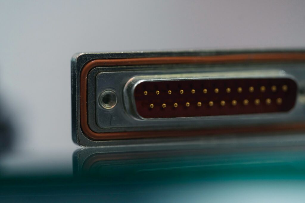 a close up of a metal object with a reflection on the surface