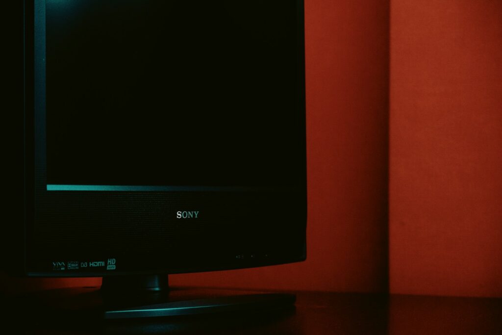 black flat screen tv turned off
